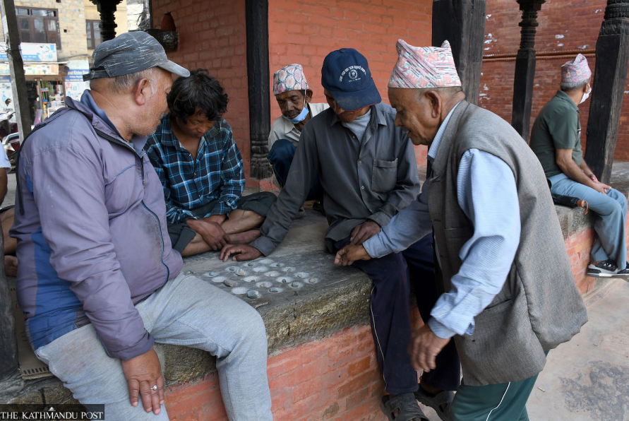 Elderly players enjoing Baghchal Patan Durbar Square Elderly players enjoing Baghchal Patan Durbar Square